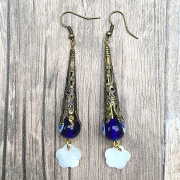 Boho bronzen oorbellen met evil eye kraal @ StyleTrash.nl