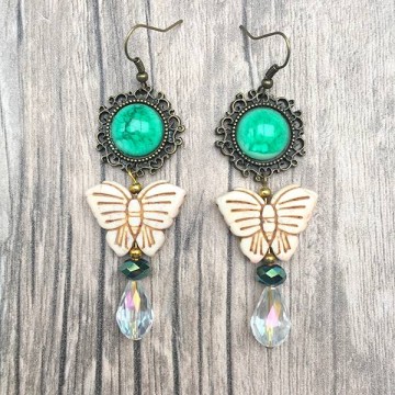 Gypsy oorbellen met creme vlinder en Turquoise steen @ StyleTrash.nl