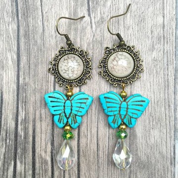 Boho oorbellen met Turquoise vlinder en roze stenen @ StyleTrash.nl